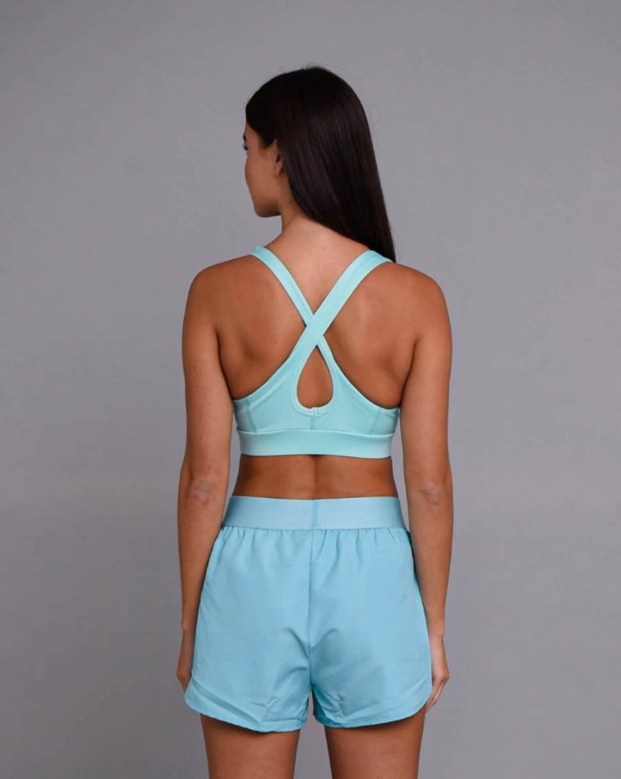 OOSC Women's Turquoise Medium Support Crossback Sports Bra for Active Workouts